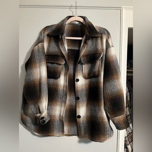 Black, brown flannel shacket